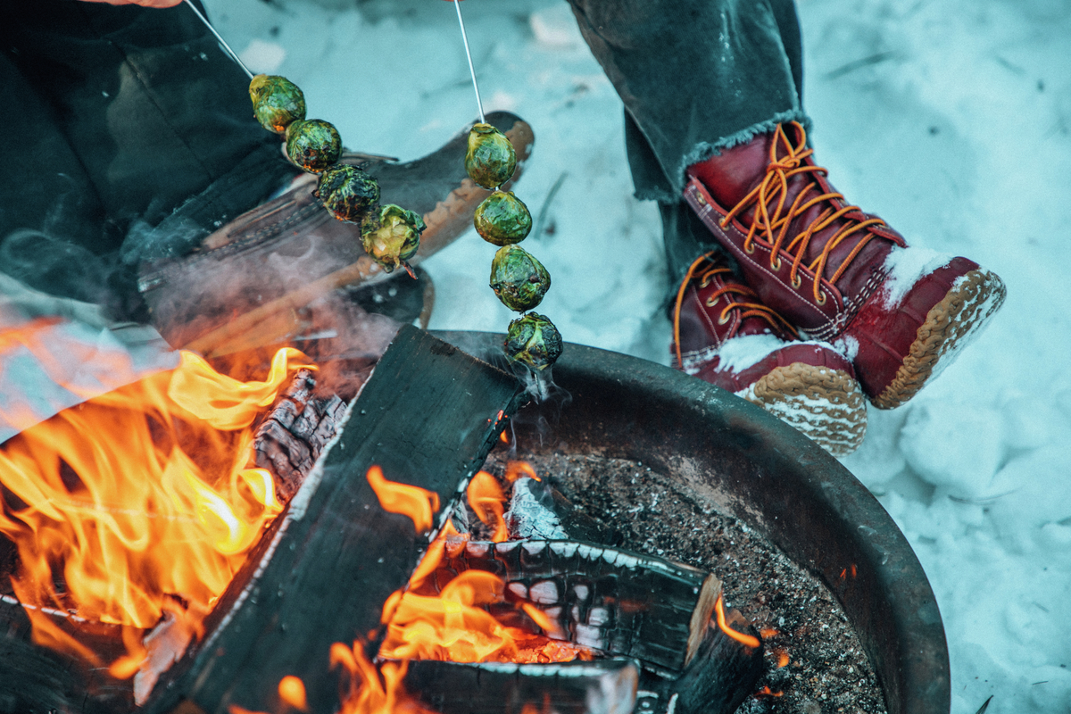 Brussel sprouts roasting over an open fire